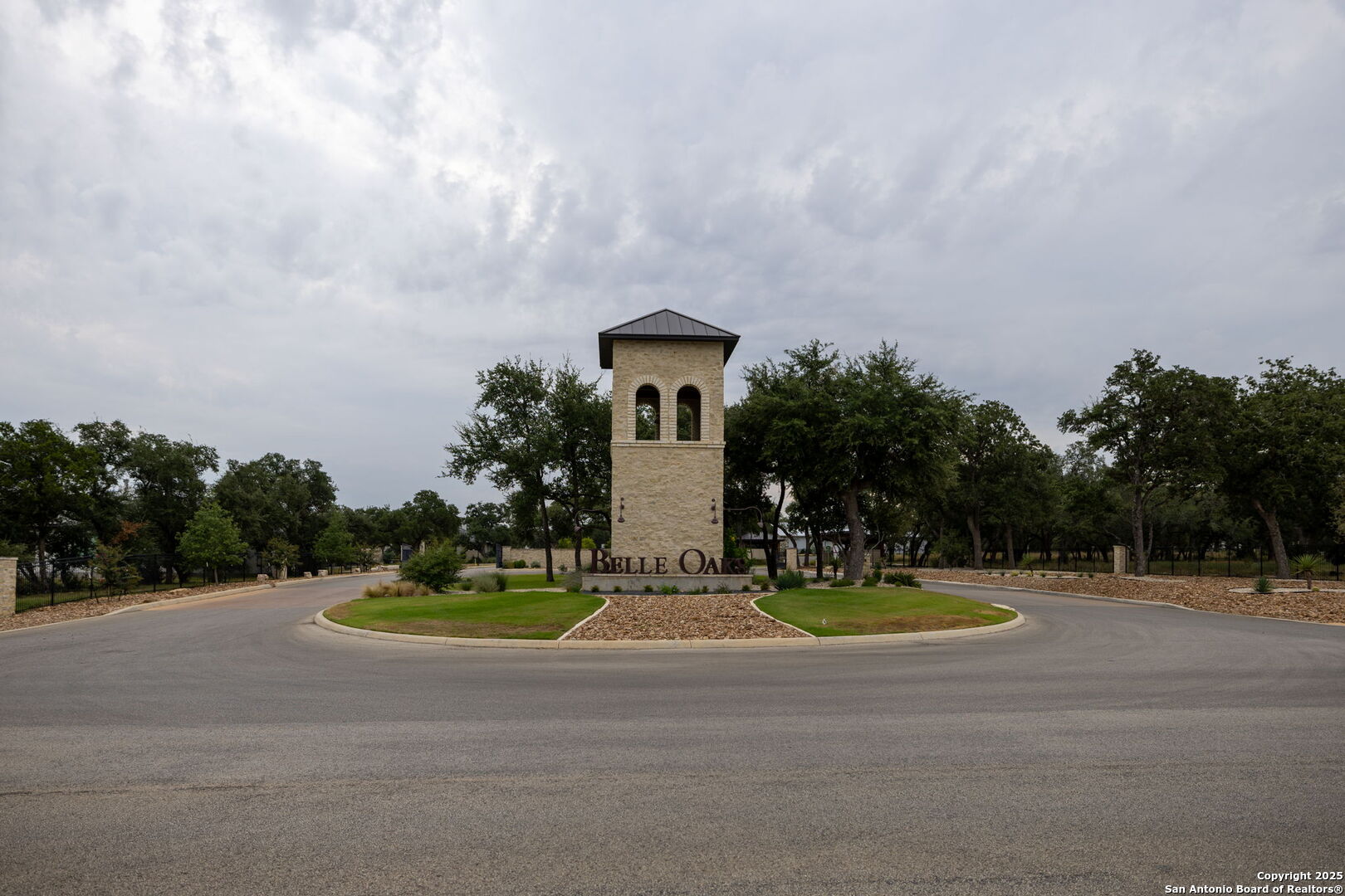593 Rosemary Rdg Drive Bulverde, TX 78163 - Photo 6 of 18 a view of a house with a yard and a large tree