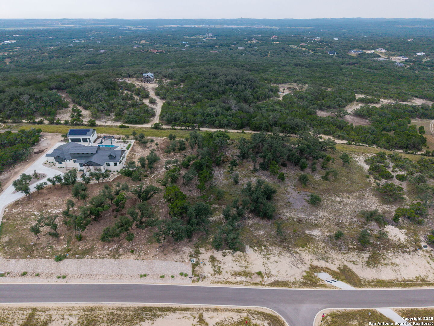 593 Rosemary Rdg Drive Bulverde, TX 78163 - Photo 8 of 18 an aerial view of residential houses with outdoor space and trees