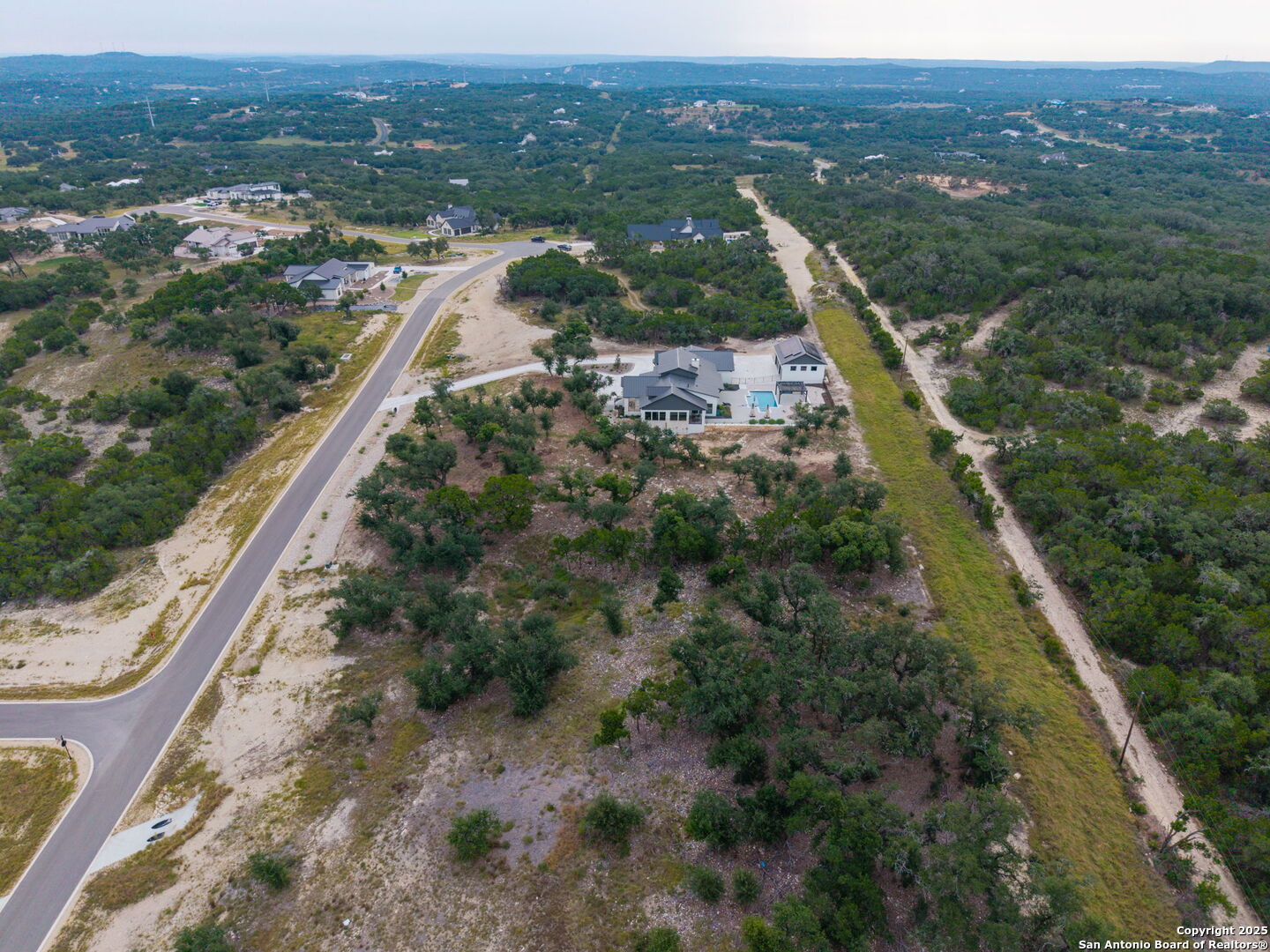 593 Rosemary Rdg Drive Bulverde, TX 78163 - Photo 10 of 18 a view of a city from a balcony
