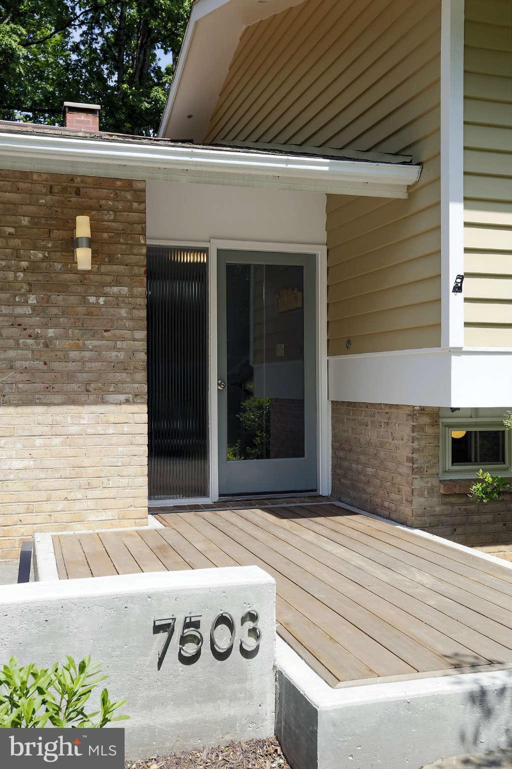 7503 Hamilton Spring Road Bethesda, MD 20817 - Photo 3 of 30 a view of a entryway door front of house