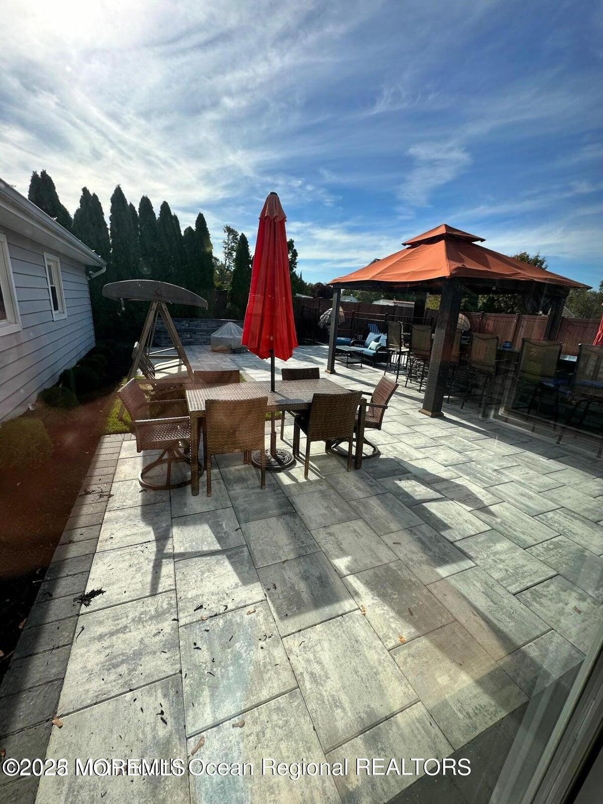 a view of outdoor space yard deck patio and outdoor kitchen