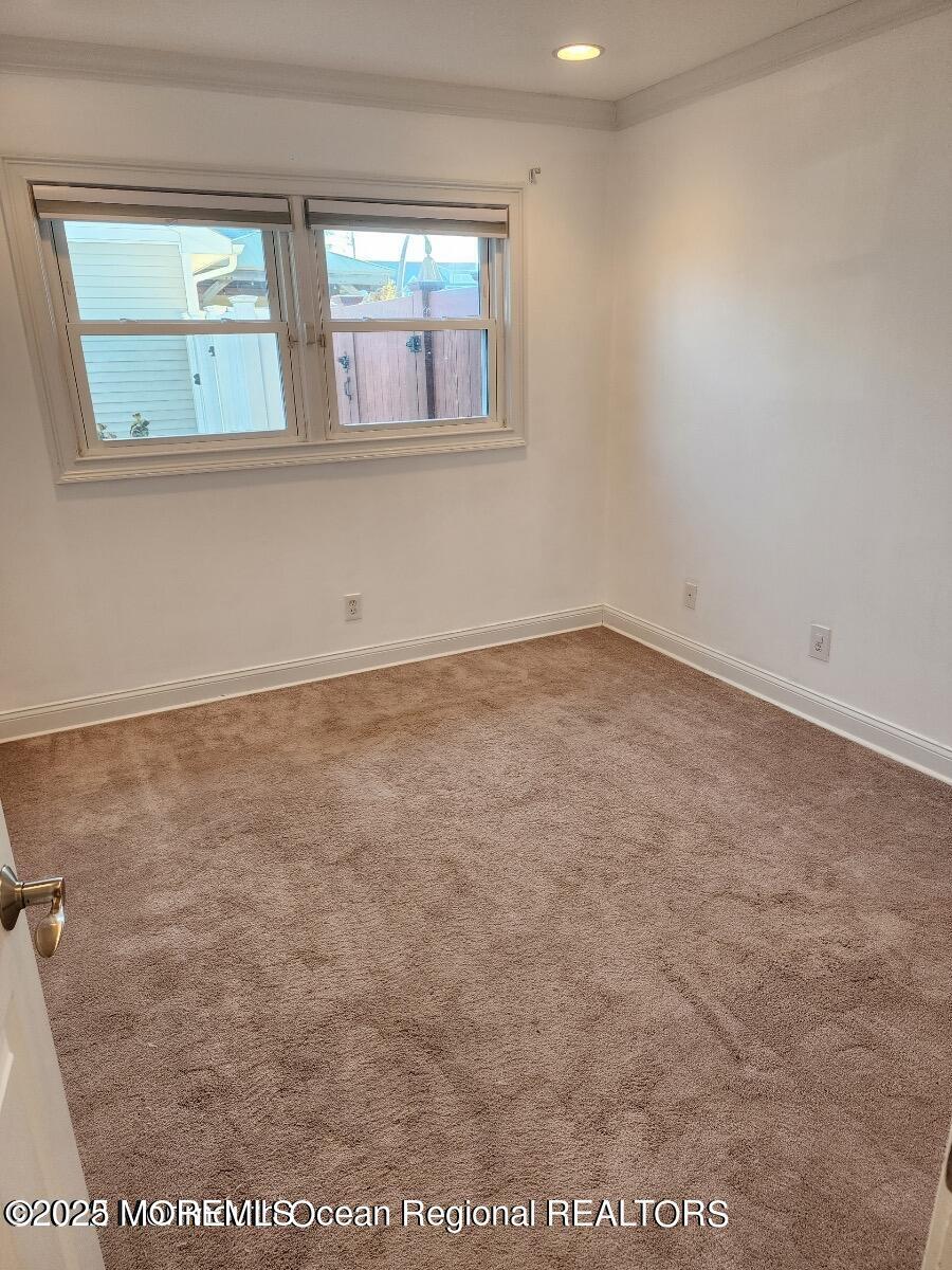 47 Poplar Avenue West Long Branch, NJ 07764 - Photo 19 of 21 an empty room with a window