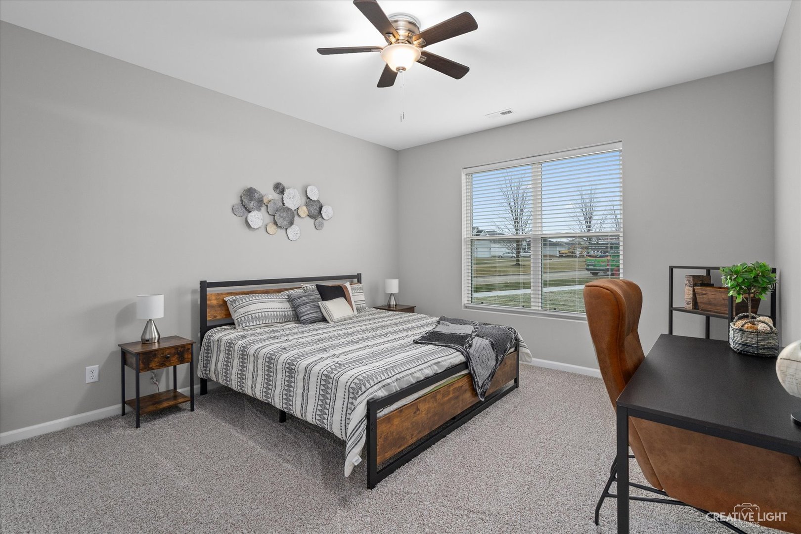 504 Preston Street Cortland, IL 60112 - Photo 11 of 21 a bedroom with a bed chair and a window