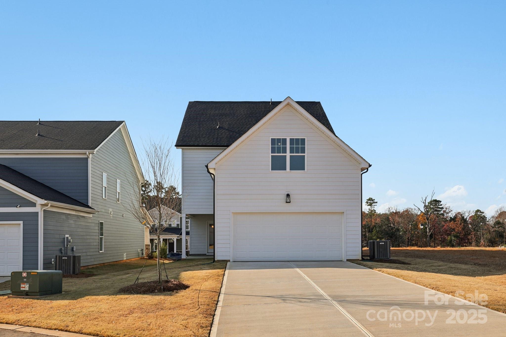 9612 Pointer Road, Unit 59 Huntersville, NC 28078 - Photo 42 of 43 a view of house and outdoor space