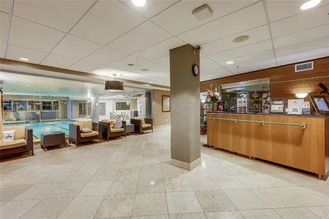 a view of a building with a swimming pool