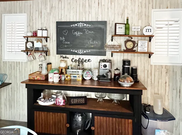 a view of a table and chairs in a room