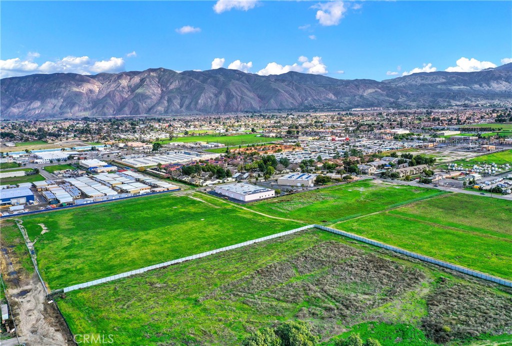 0 M/l In Por Trail Hemet, CA 92543 - Photo 2 of 9 a view of a lush green hillside and a houses