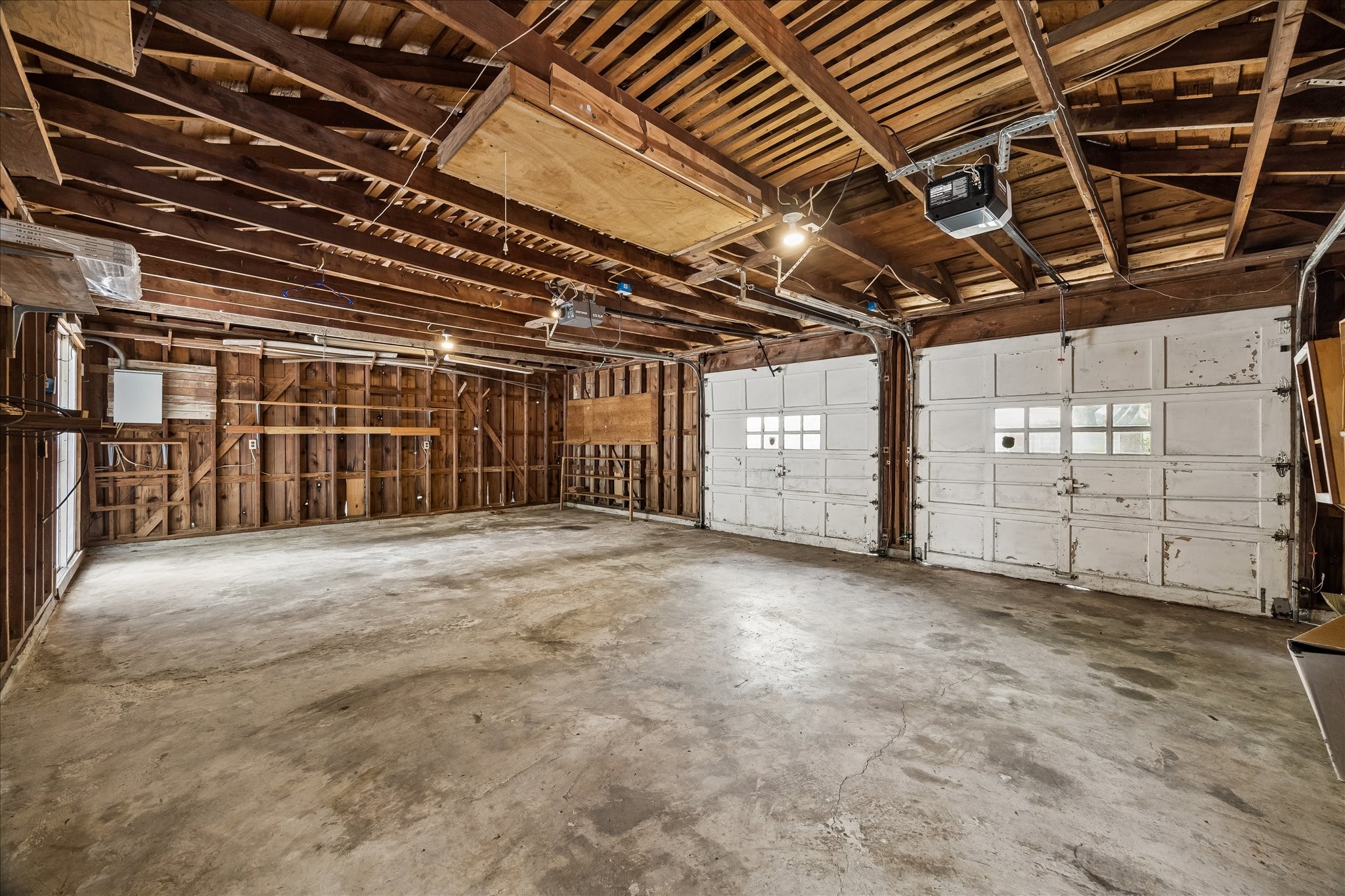 3314 Tanglewilde Street Houston, TX 77063 - Photo 11 of 23 Full Two Car garage with additional work space for plenty of storage!