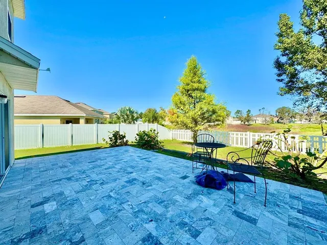 a view of a lake in middle of the house