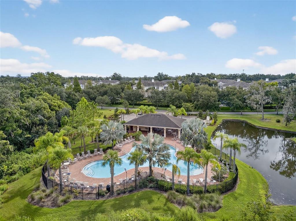 35743 Hillbrook Avenue Zephyrhills, FL 33541 - Photo 44 of 44 an aerial view of a house with a lake view