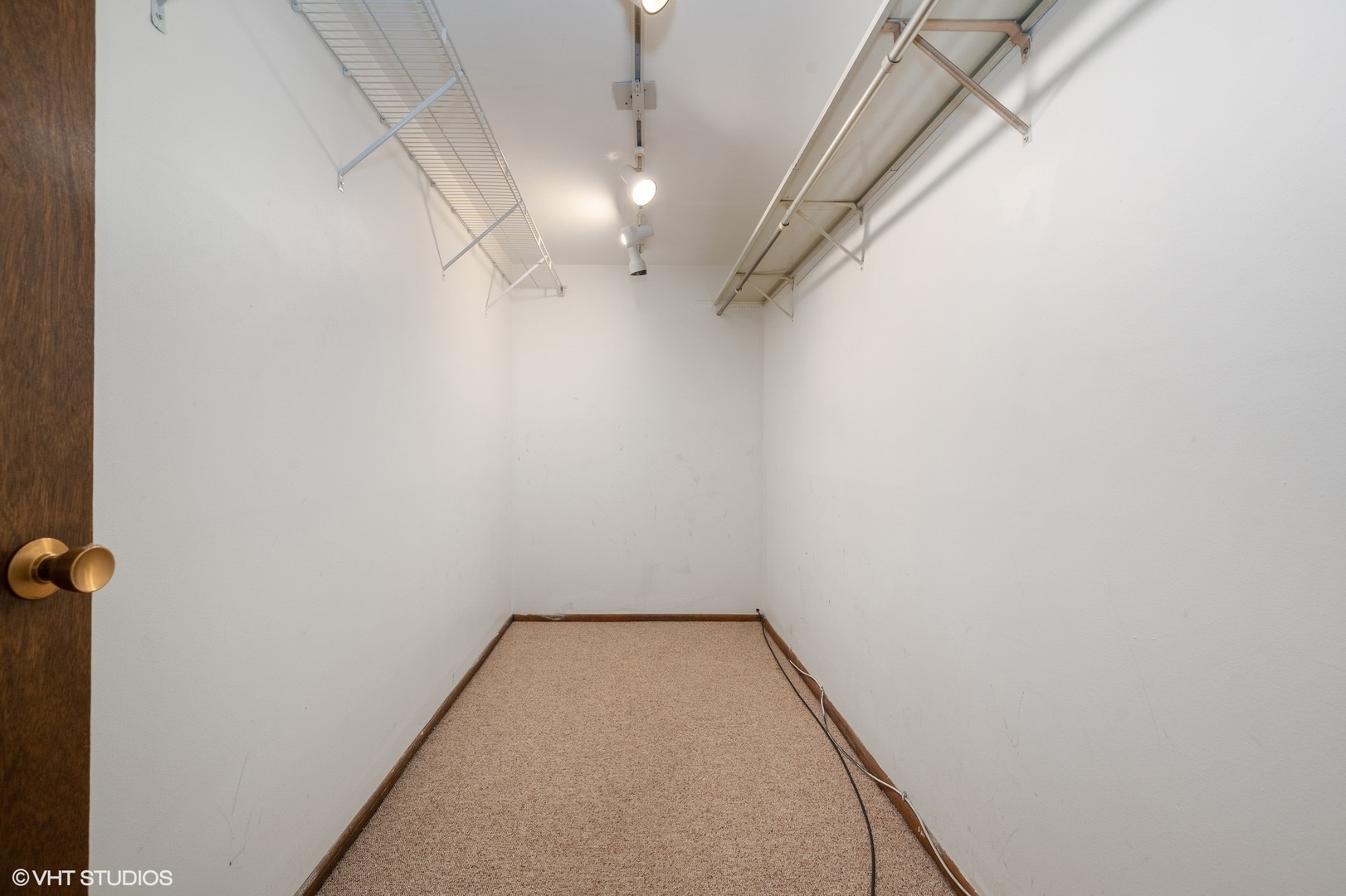 651 West Sheridan Road, Unit 2C Chicago, IL 60613 - Photo 13 of 16 a view of small space with empty racks