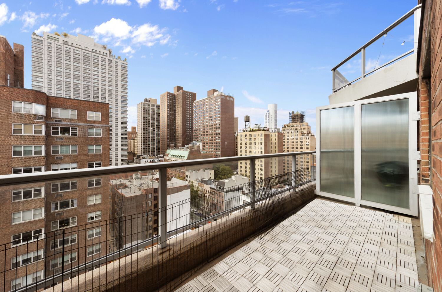 300 East 71st Street, Unit 16HJ Manhattan, NY 10021 - Photo 7 of 8 a view of balcony with city view