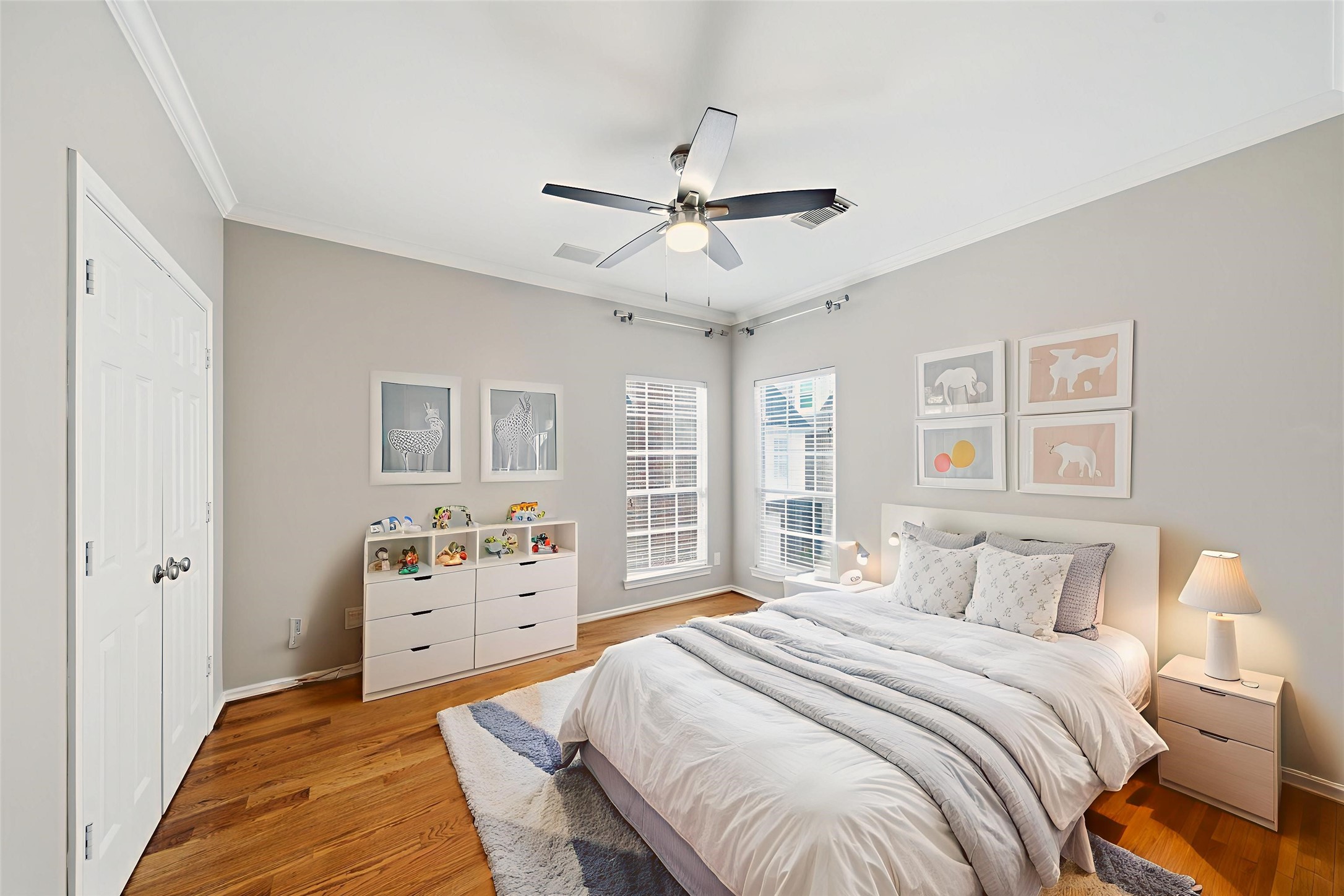 1736 Colquitt Street, Unit A Houston, TX 77098 - Photo 18 of 45 Located to the right at the top of the stairs, this sunny bedroom offers flexibility for use as a guest room, nursery, or home office. - Virtually Staged -