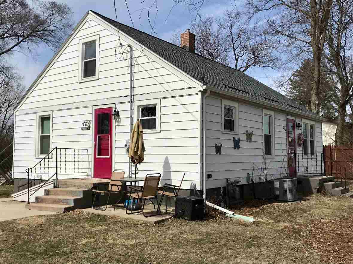 216 South Washington Street Byron, IL 61010 - Photo 2 of 25 a view of house with a yard