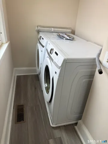 a utility room with dryer and washer
