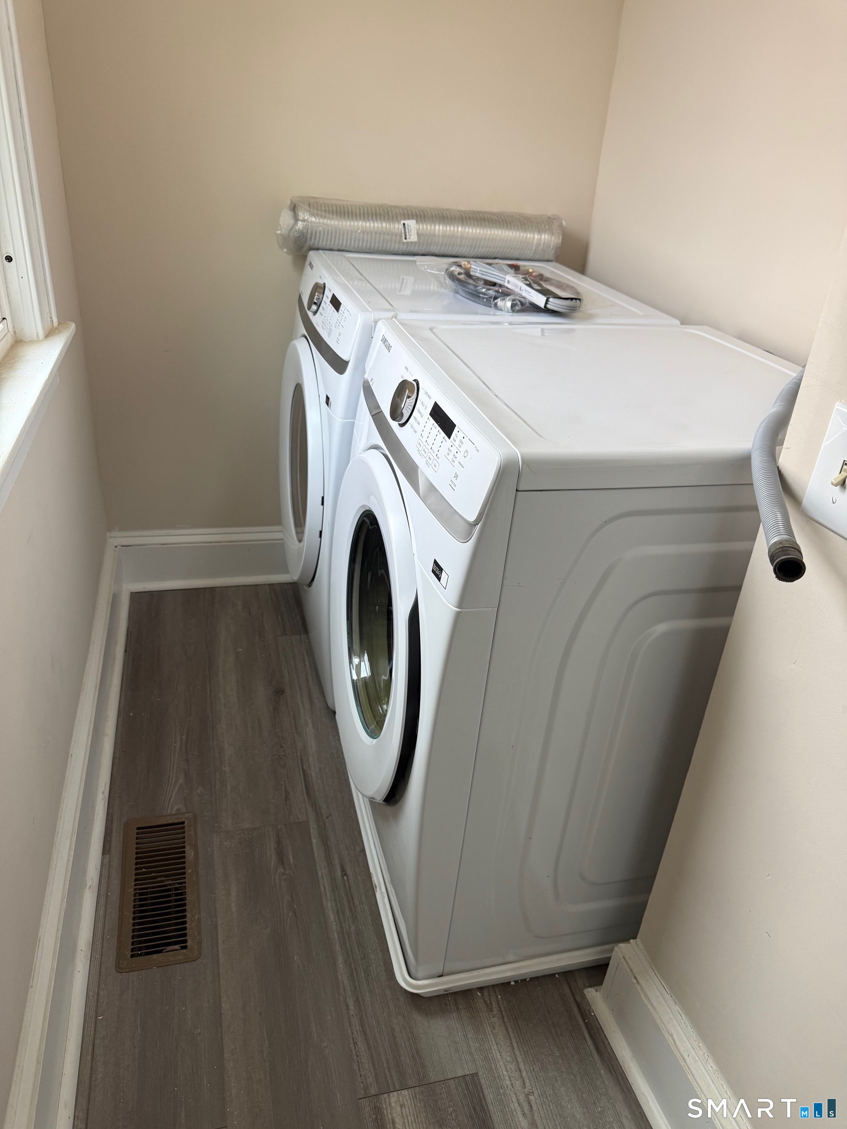 484 West Street Bristol, CT 06010 - Photo 15 of 15 a utility room with dryer and washer