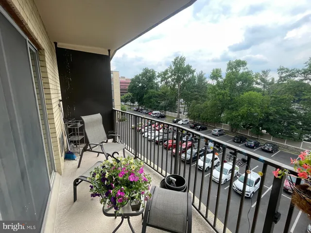 a view of balcony with furniture