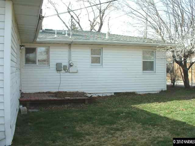 225 Hillcrest Drive Reno, NV 89509 - Photo 7 of 7 a backyard of a house with lots of green space