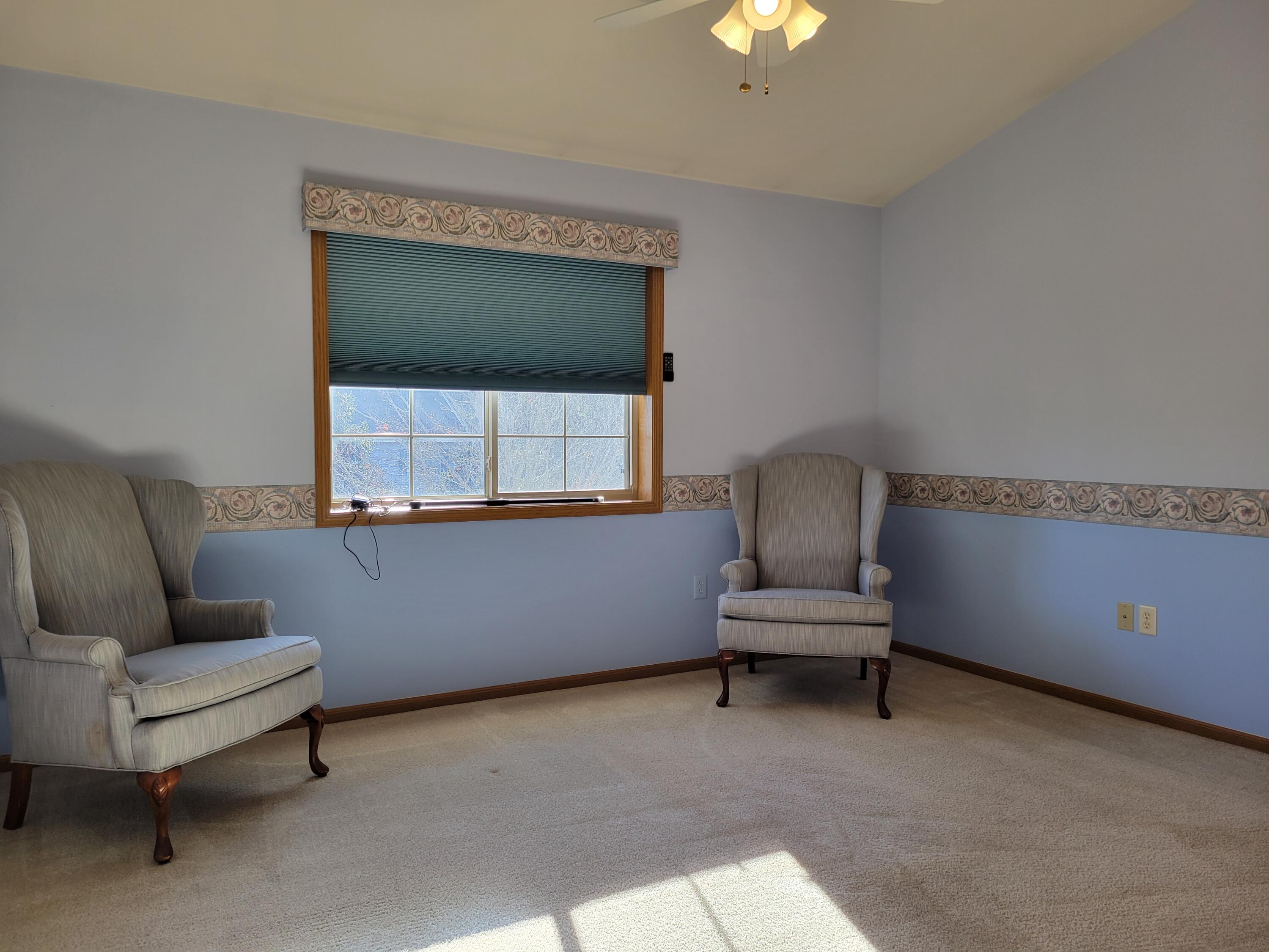 2111 Pine Ridge Court, Unit E Grafton, WI 53024 - Photo 13 of 35 Primary bedroom