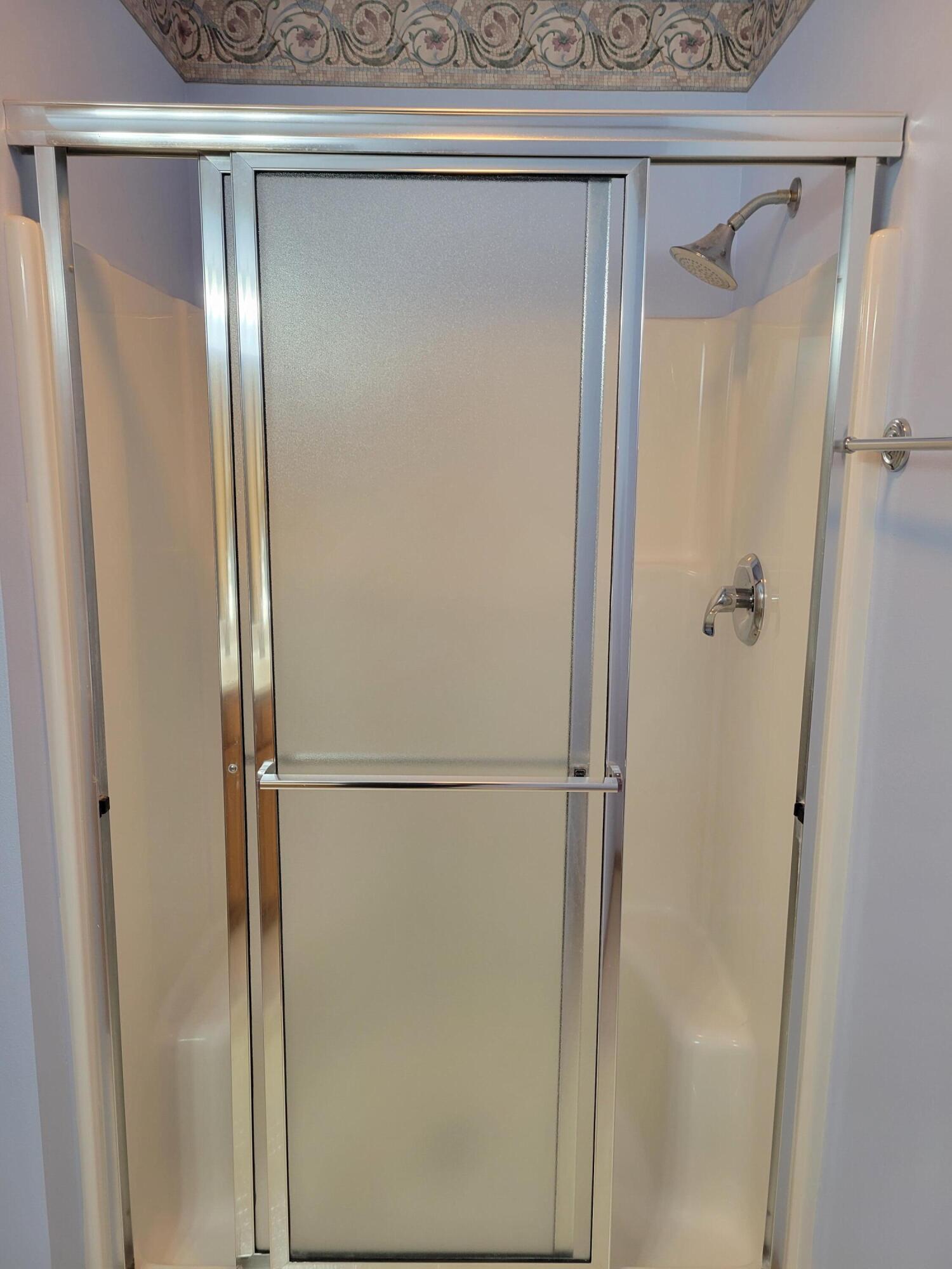 2111 Pine Ridge Court, Unit E Grafton, WI 53024 - Photo 18 of 35 Primary shower