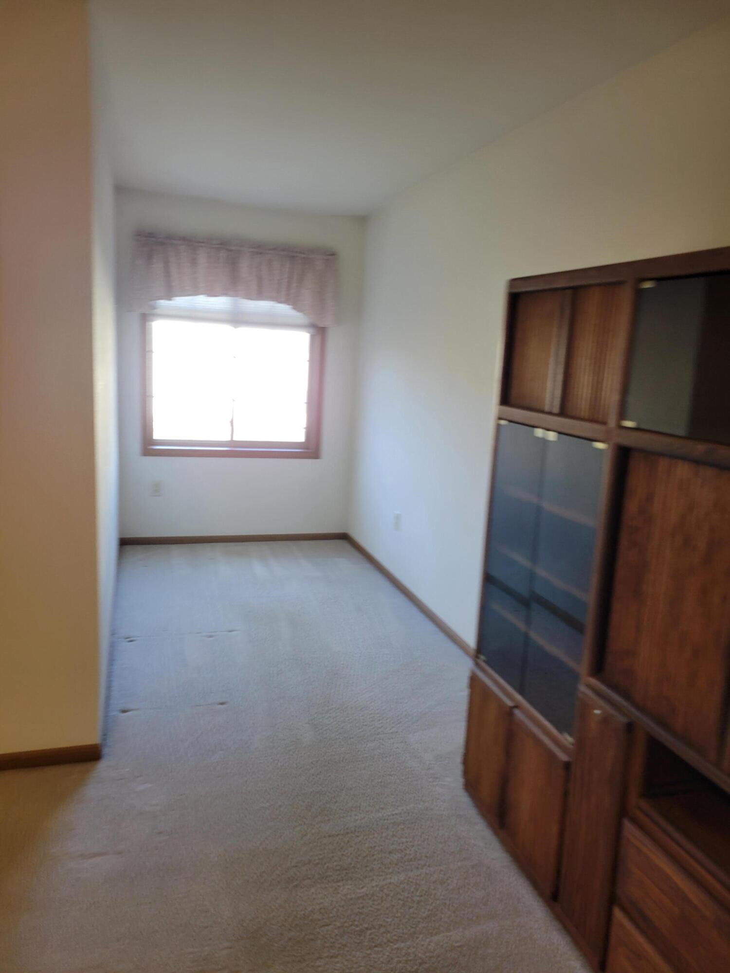 2111 Pine Ridge Court, Unit E Grafton, WI 53024 - Photo 20 of 35 Study nook - bedroom #2