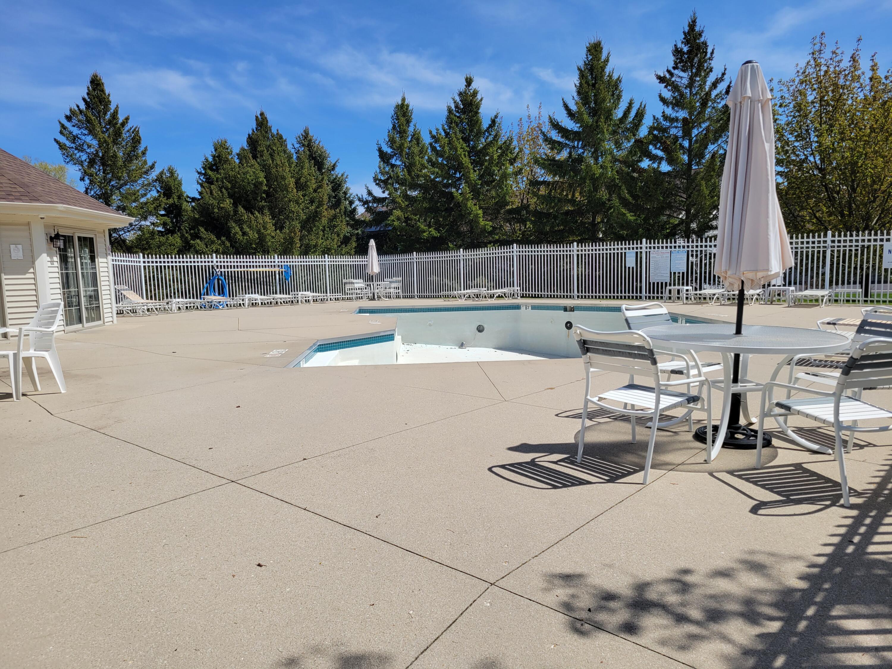 2111 Pine Ridge Court, Unit E Grafton, WI 53024 - Photo 34 of 35 Summertime Pool