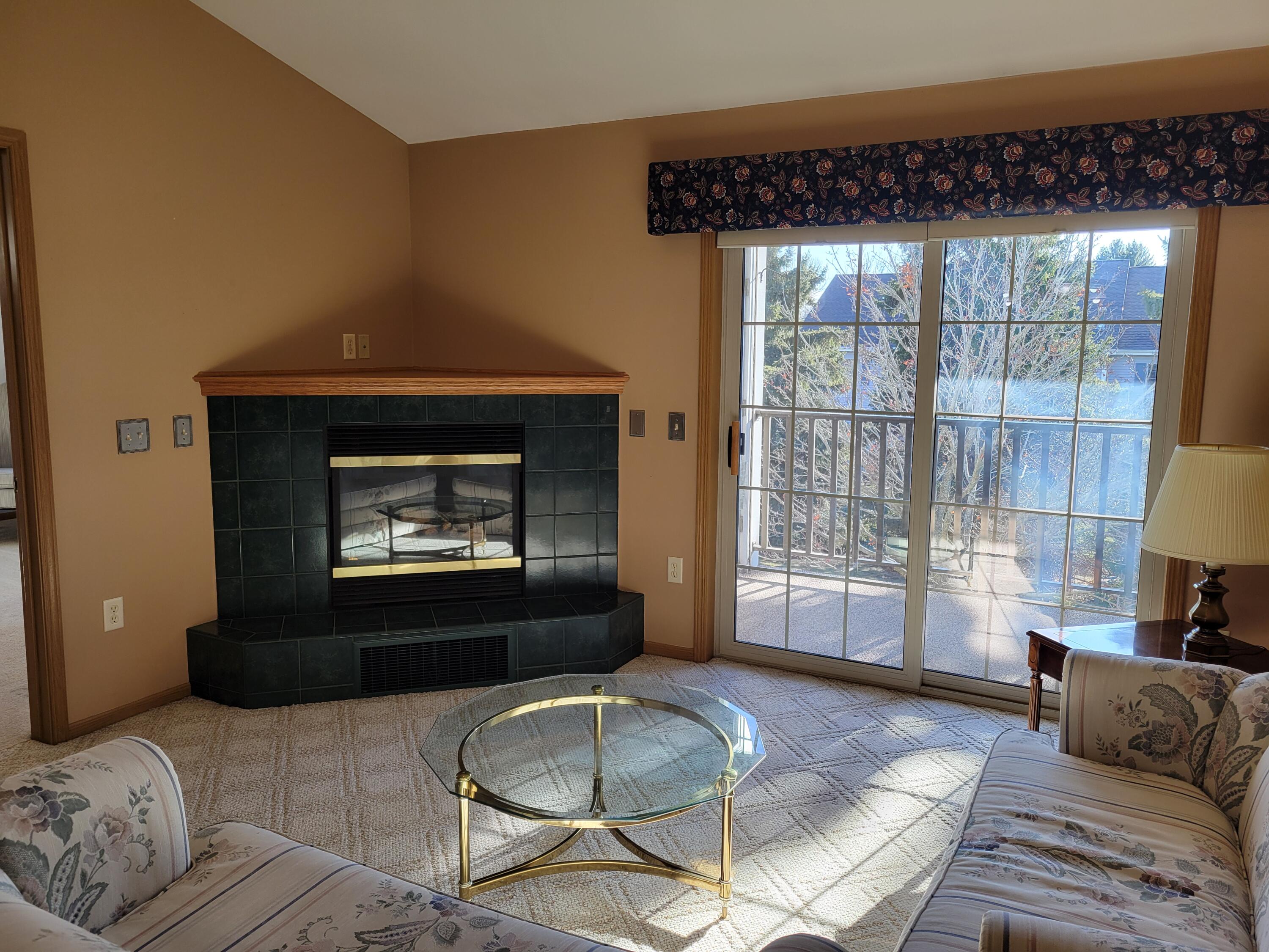 2111 Pine Ridge Court, Unit E Grafton, WI 53024 - Photo 4 of 35 Gas Fireplace & Balcony