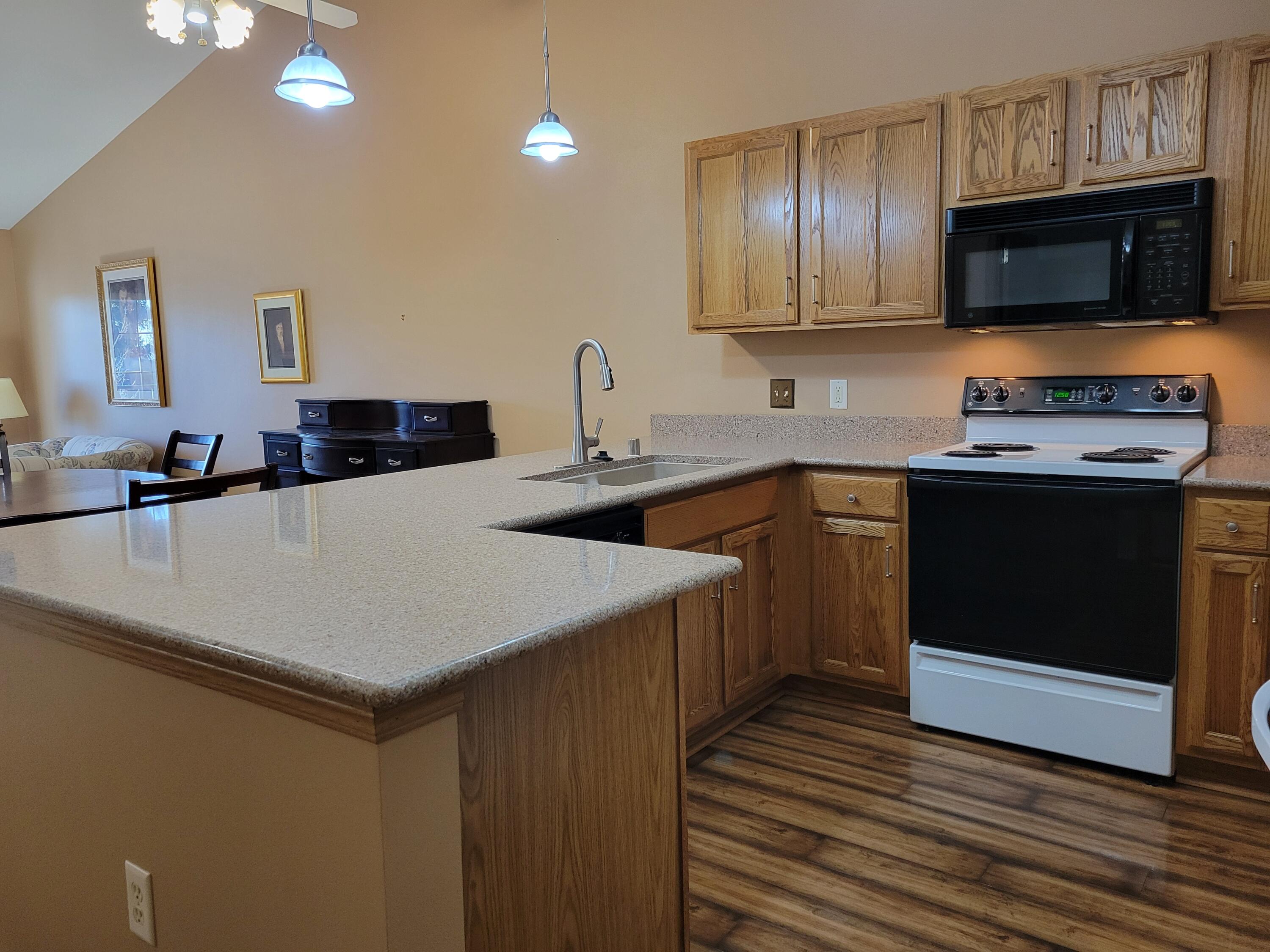 2111 Pine Ridge Court, Unit E Grafton, WI 53024 - Photo 10 of 35 Kitchen view