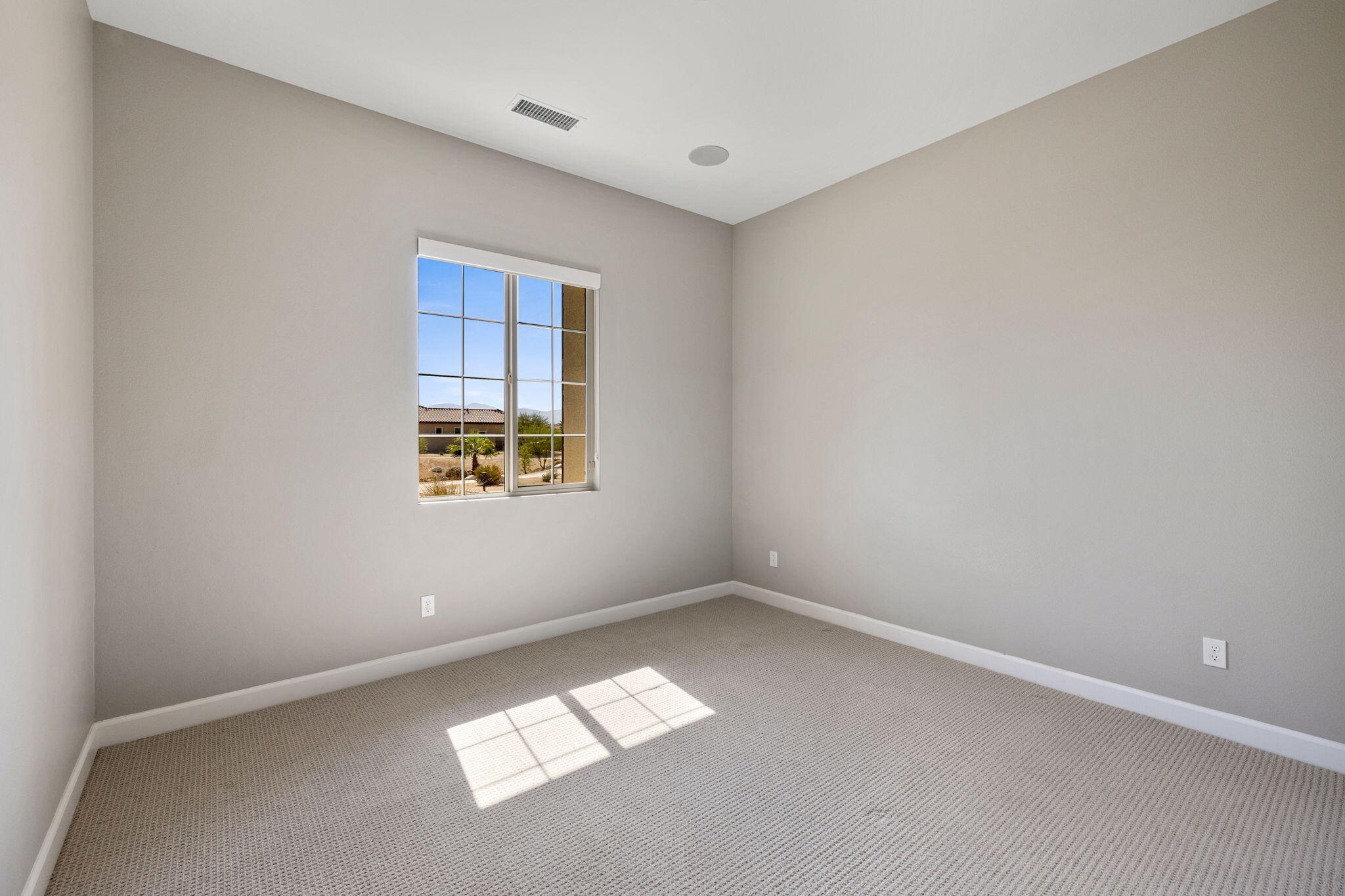 60 Prosecco Rancho Mirage, CA 92270 - Photo 45 of 48 an empty room with a window