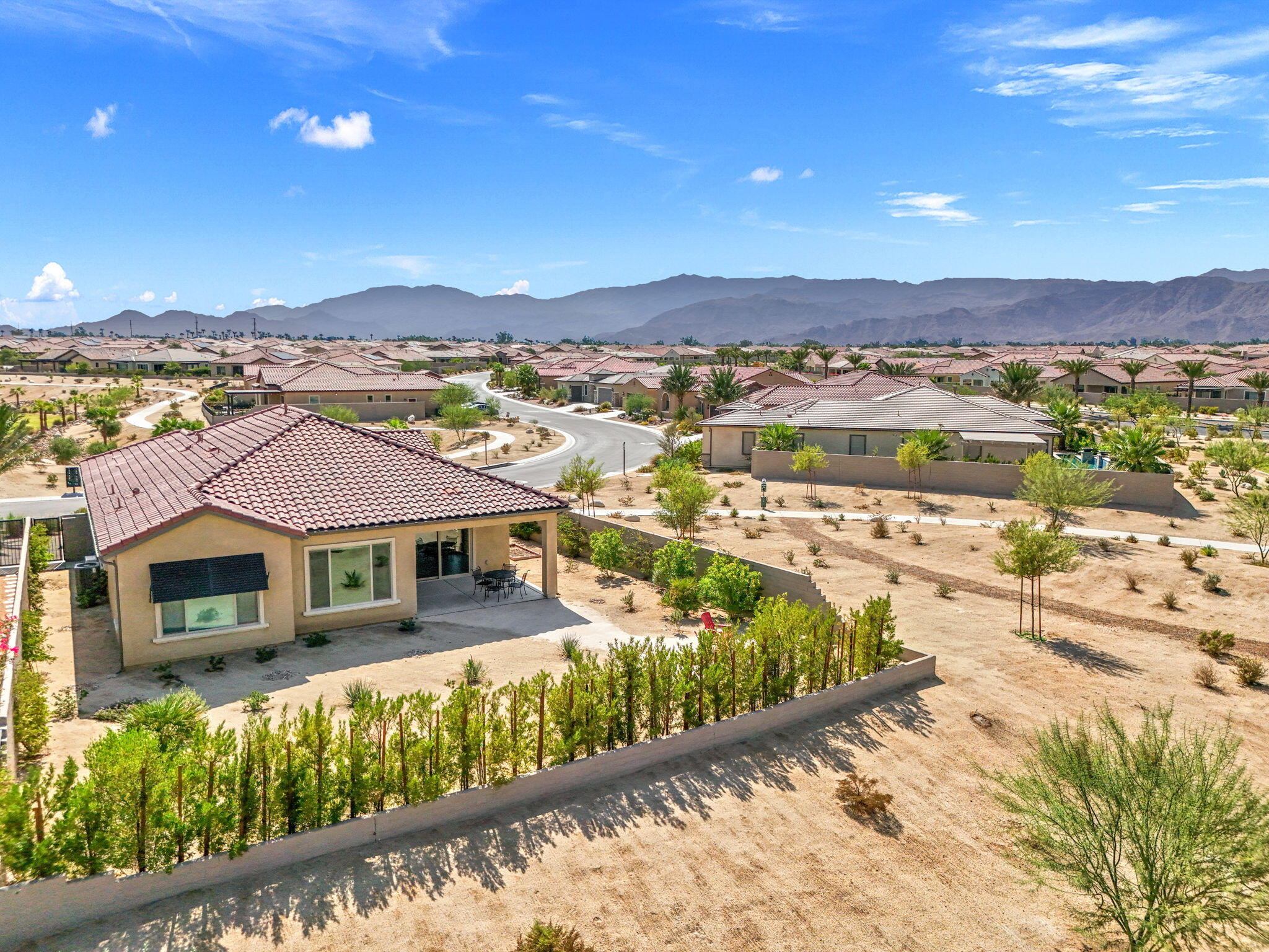 60 Prosecco Rancho Mirage, CA 92270 - Photo 5 of 48 a view of a house with a yard