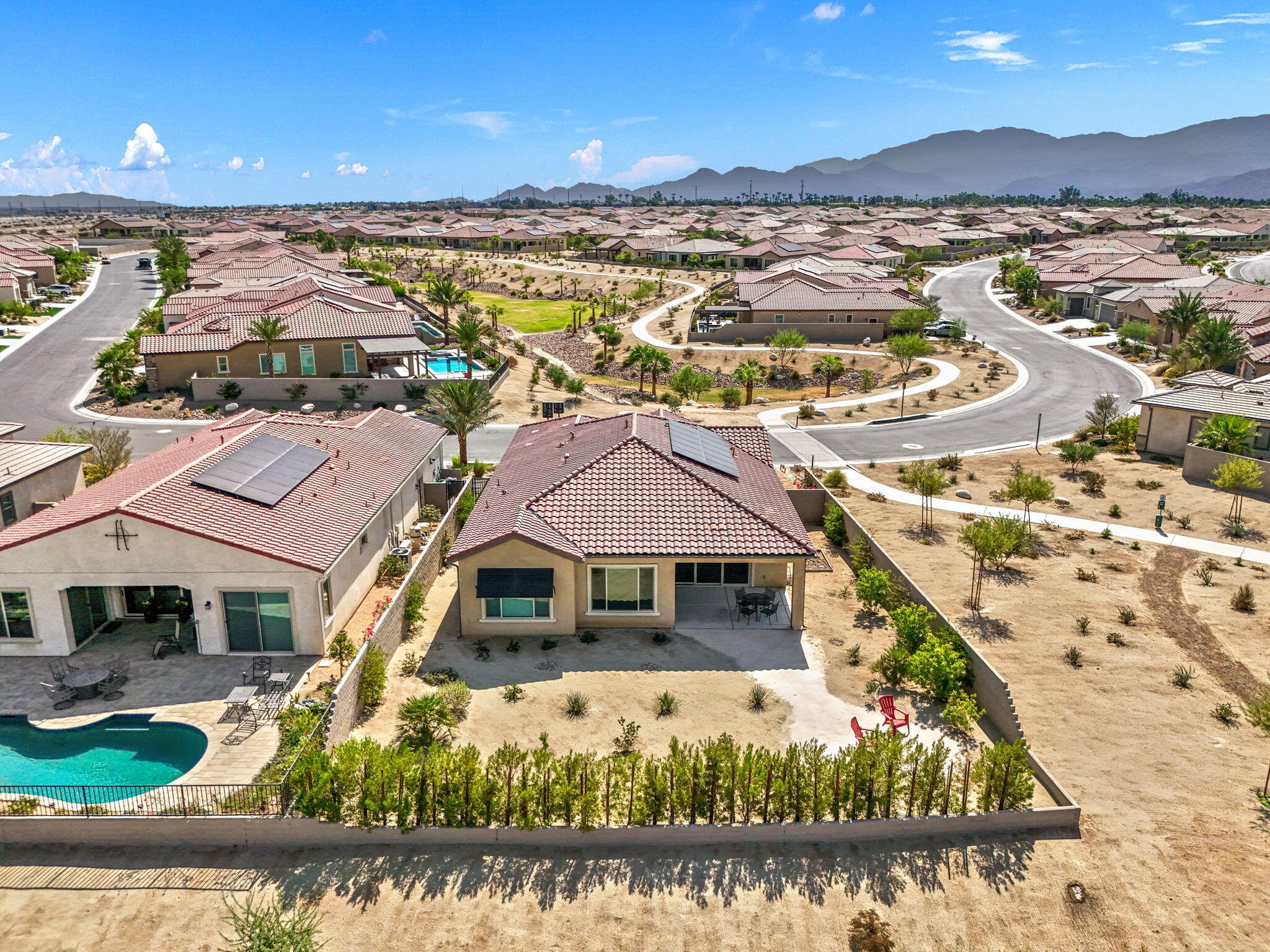 60 Prosecco Rancho Mirage, CA 92270 - Photo 6 of 48 a view of a city with lawn chairs