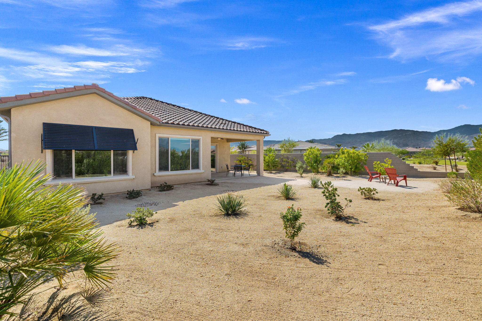60 Prosecco Rancho Mirage, CA 92270 - Photo 10 of 48 a view of a house with a patio