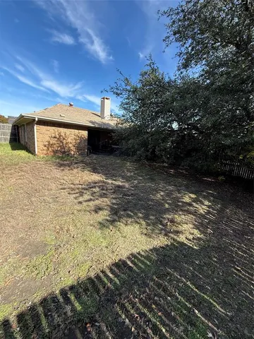 a bed room with furniture and a chandelier