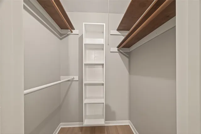 a view of staircase with white walls