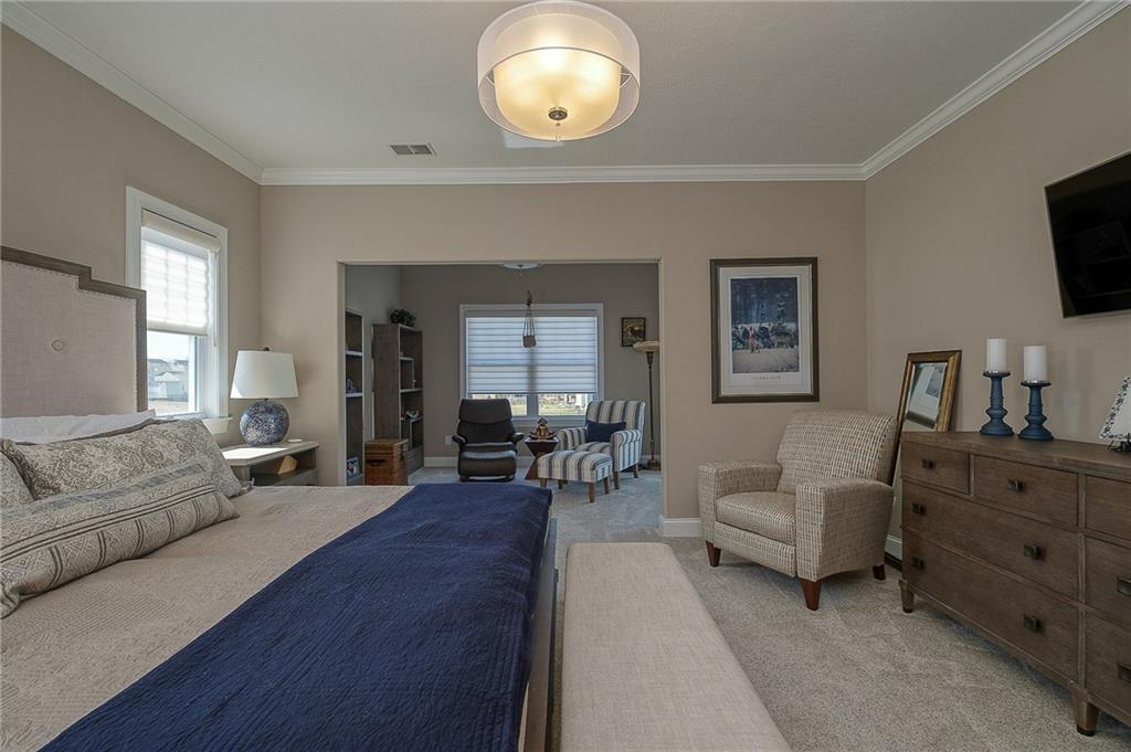 116 Seneca Place Mars, PA 16046 - Photo 14 of 25 a living room with furniture a flat screen tv and a large window