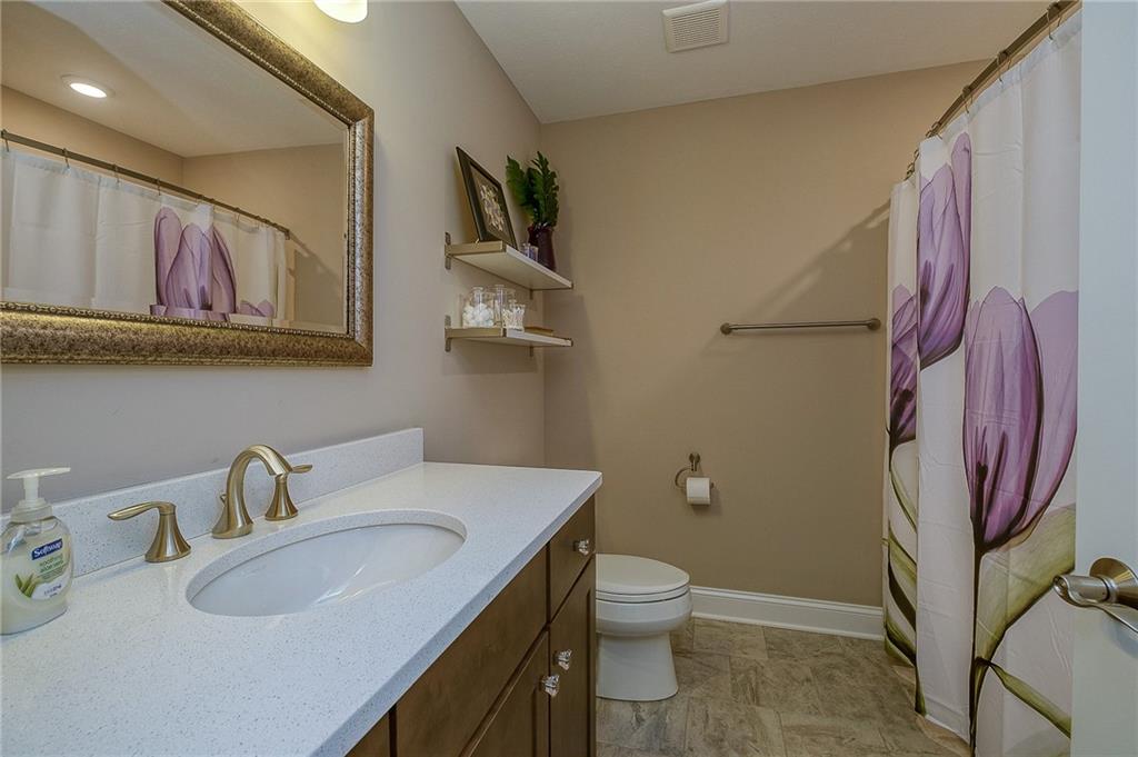 116 Seneca Place Mars, PA 16046 - Photo 19 of 25 a bathroom with a sink a toilet and a mirror