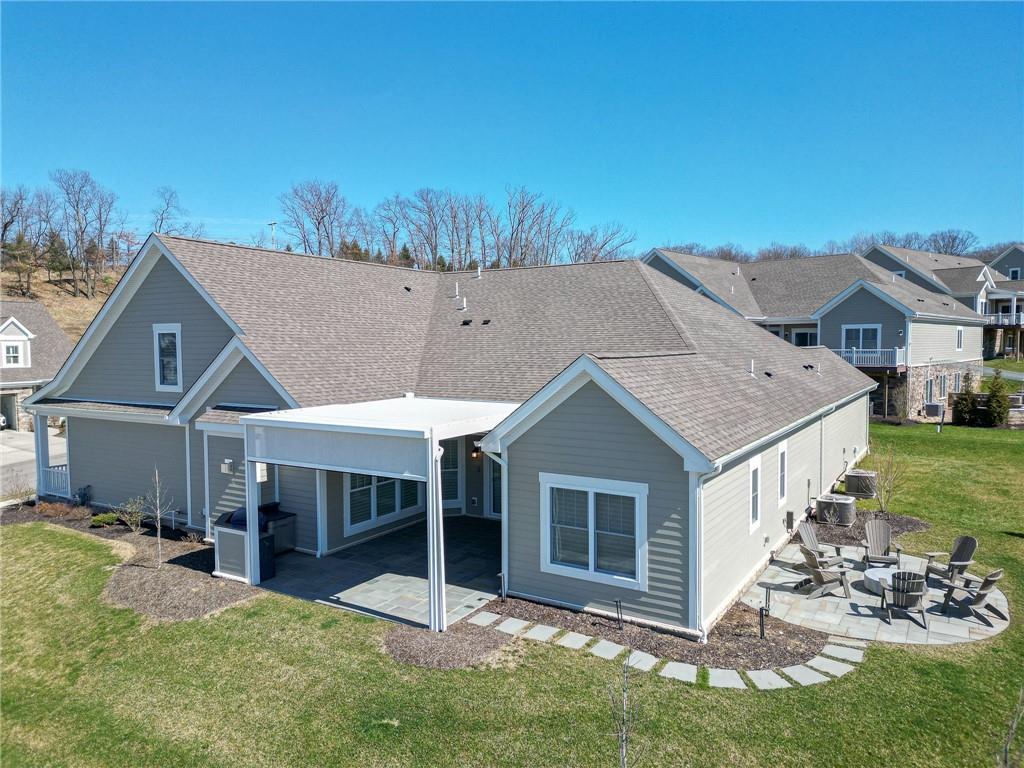 116 Seneca Place Mars, PA 16046 - Photo 4 of 25 a aerial view of a house with table and chairs