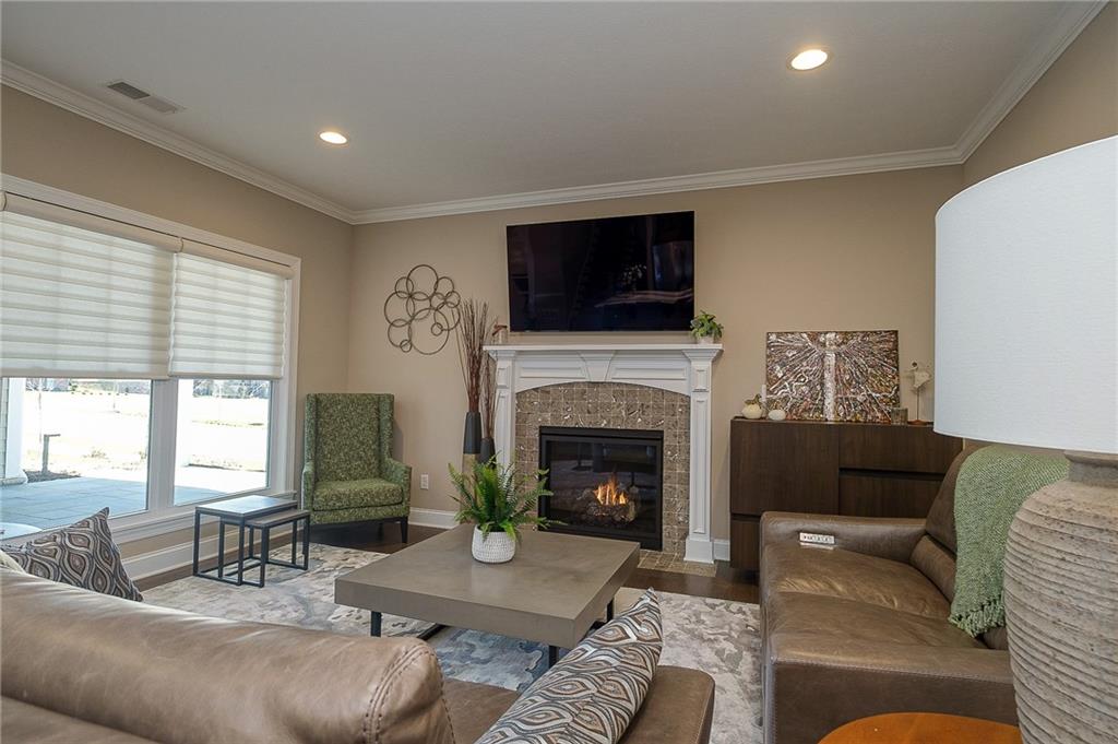 116 Seneca Place Mars, PA 16046 - Photo 6 of 25 a living room with furniture and a fireplace