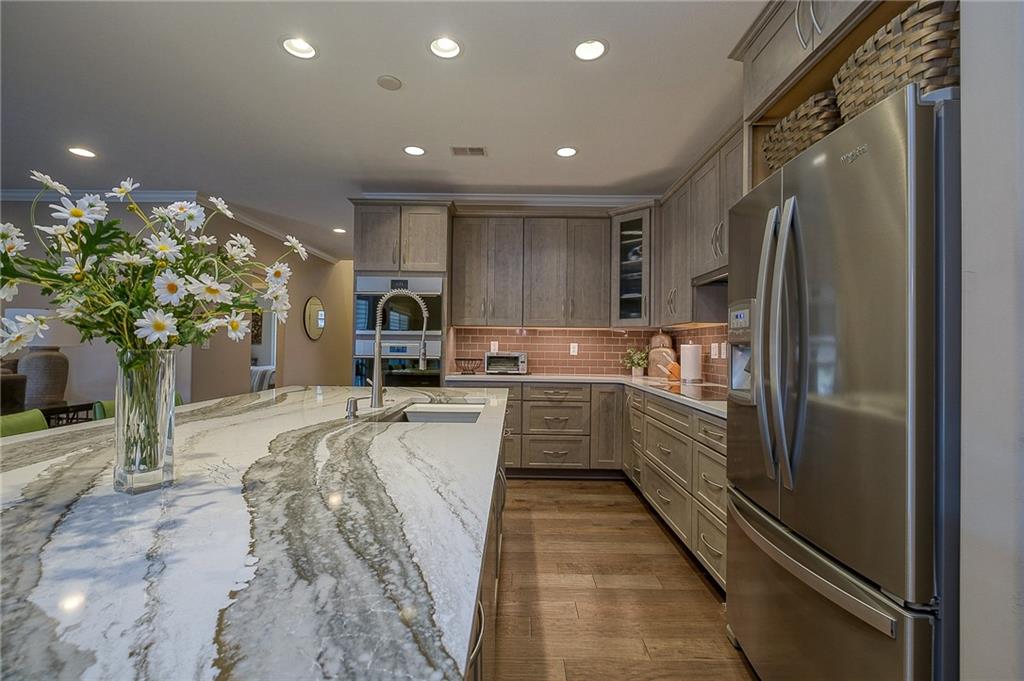 116 Seneca Place Mars, PA 16046 - Photo 7 of 25 a kitchen with sink refrigerator and microwave