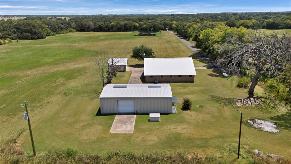 12748 County Road 4077 Scurry, TX 75158 - Photo 14 of 40 a view of a lake with a mountain