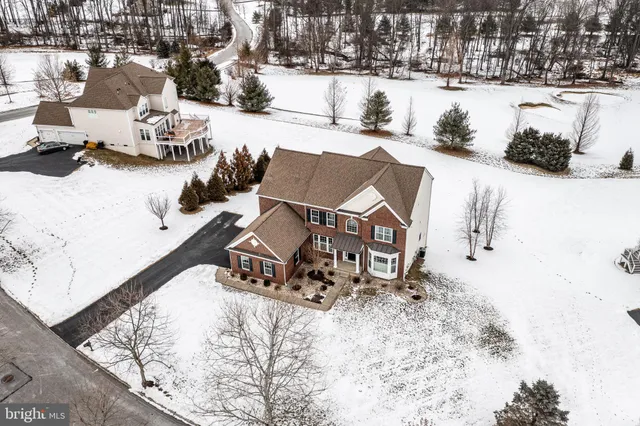 a picture of a bathroom with a sink and mirror