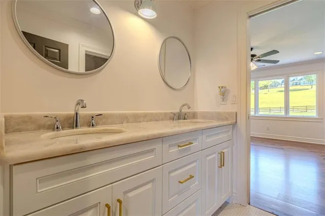 a view of a refrigerator in kitchen and wooden floor
