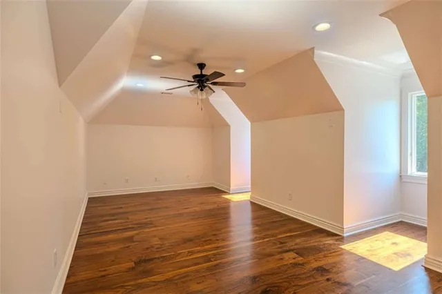 a view of a patio with a table and chairs