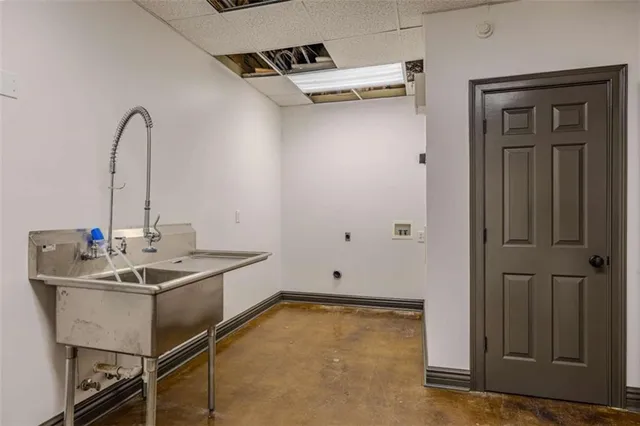 a view of a swimming pool with a lounge chairs