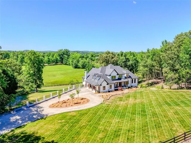 a view of livingroom with furniture and hardwood floor