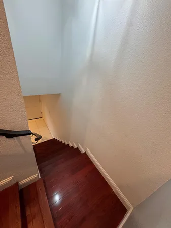 a view of entryway with wooden floor