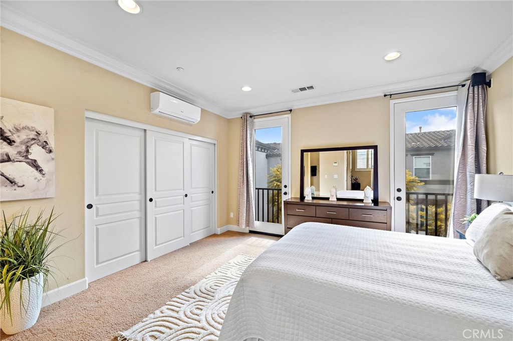 8028 Monaco Stanton, CA 90680 - Photo 20 of 35 Primary bedroom has french doors