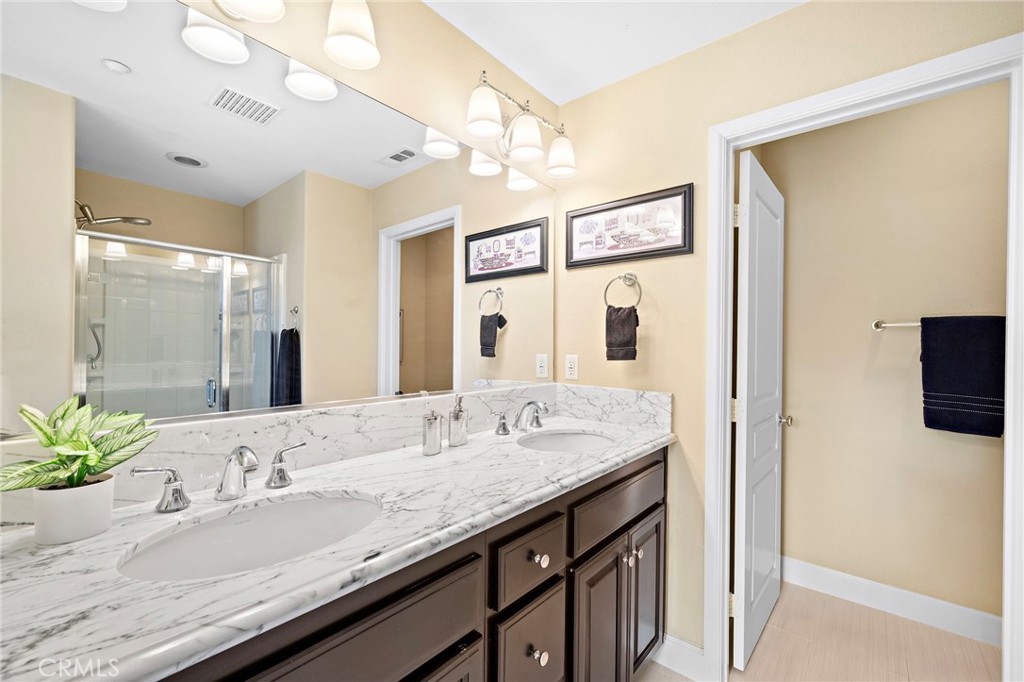 8028 Monaco Stanton, CA 90680 - Photo 24 of 35 Dual sinks in the primary suite