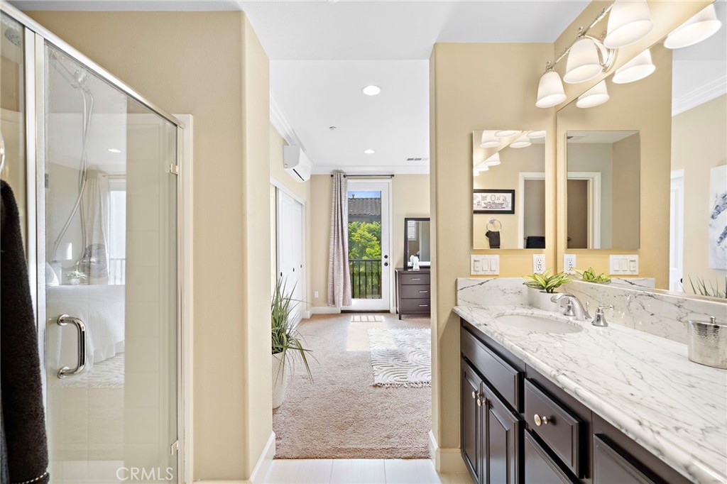 8028 Monaco Stanton, CA 90680 - Photo 25 of 35 Walk in shower in the primary suite