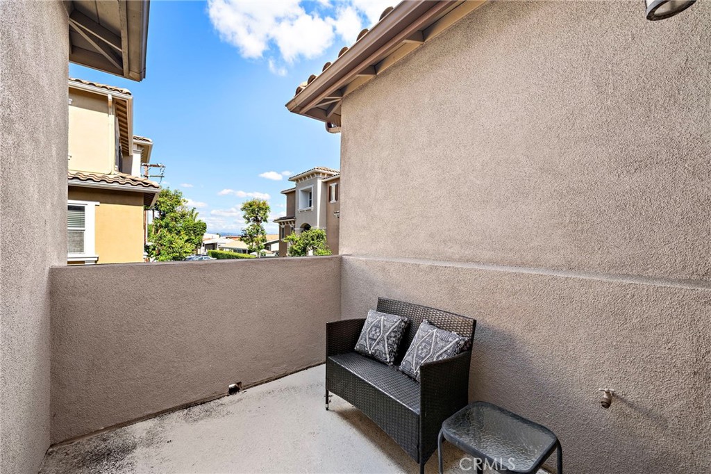 8028 Monaco Stanton, CA 90680 - Photo 6 of 35 private second-level patio perfect for evening barbeques and dining